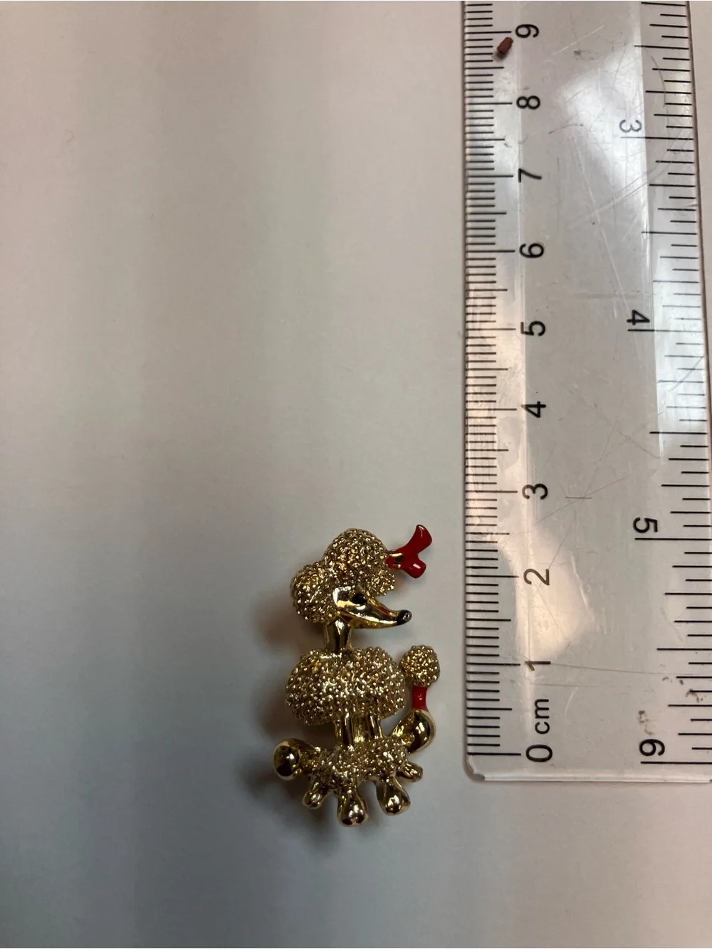 Vintage Gold Tone Poodle Brooch with Red Accents